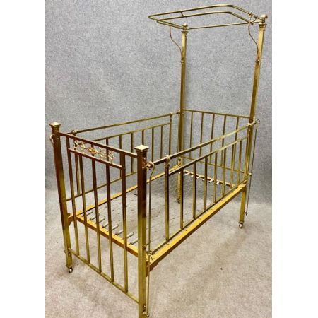 Antikes Kinderbett aus poliertem Messing um 1910