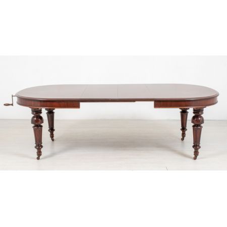 Antiker ausziehbarer Esstisch aus Mahagoni