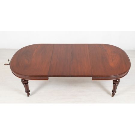 Antiker ausziehbarer Esstisch aus Mahagoni