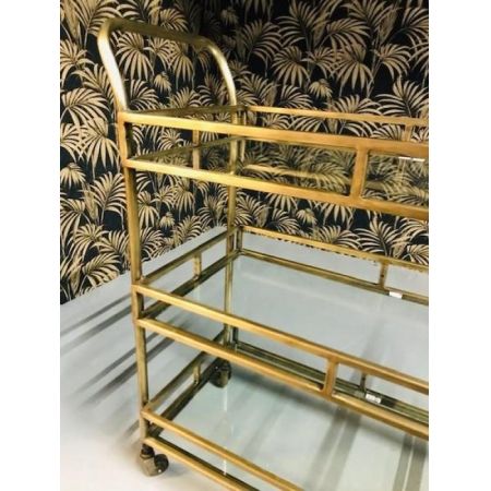 Vergoldeter Rollwagen mit gläsernen Ablageflächen