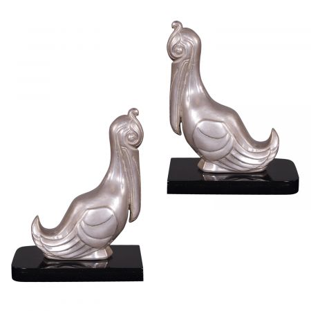 "Bücherstützen Pelikane" vernickelte Bronzefiguren mit handbemalten Details