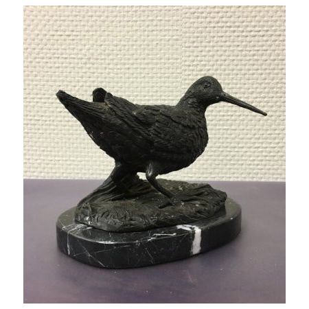 "Schnepfe auf Marmorsockel"