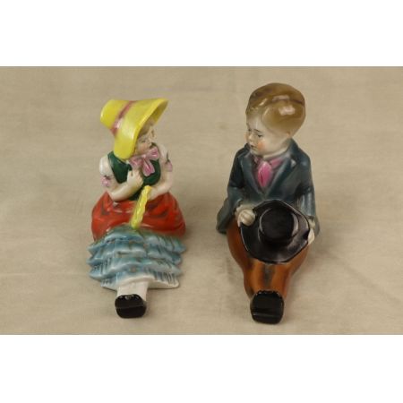 Set Junge und Mädchen Porzellan Figuren Buchstützen