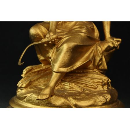 Figur Frau Gold mit Sense  France