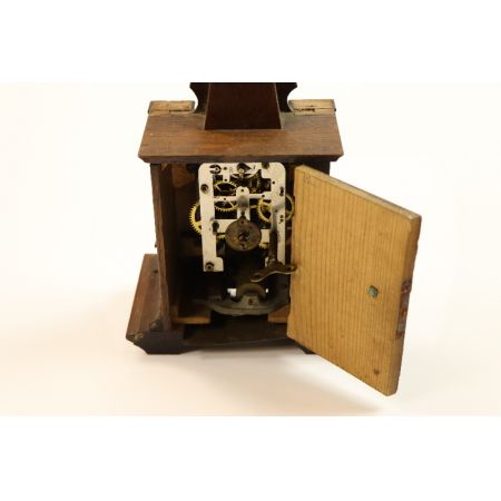 Antike Kaminuhr aus Holz