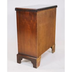 Kleine Kommode aus Mahagoni mit ausklappbarer Topplatte