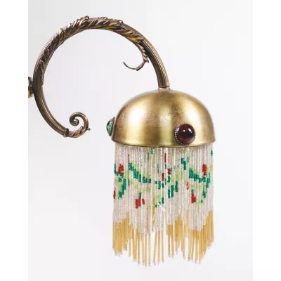 ausgefallende Wandlampe mit Perlen
