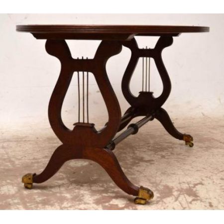 Antiker Tisch mit Ledereinsatz oval