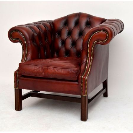 Antiker tief geknöpfter Ledersessel 