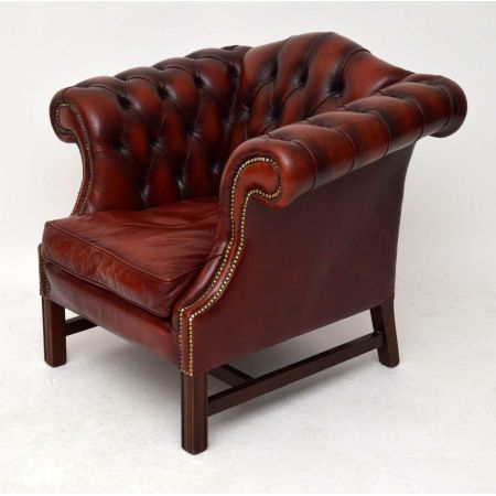 Antiker tief geknöpfter Ledersessel 