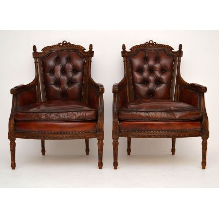 Ein Paar antike geschnitzte Nussbaum - Leder Sessel