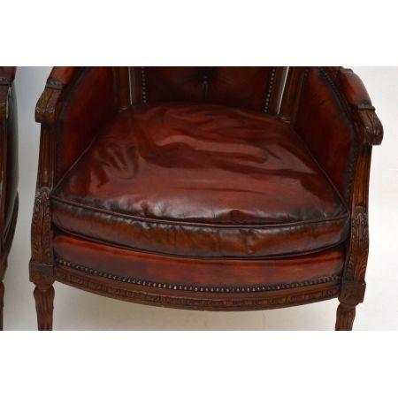 Ein Paar antike geschnitzte Nussbaum - Leder Sessel