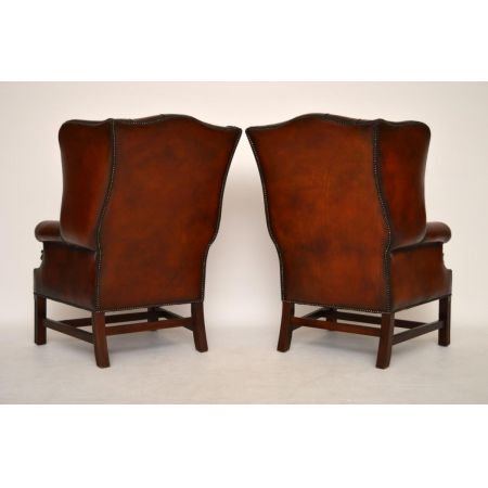 Ein Paar antiker Leder-Ohren Sessel