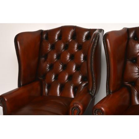 Ein Paar antiker Leder-Ohren Sessel