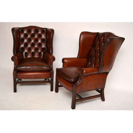 Ein Paar antiker Leder-Ohren Sessel