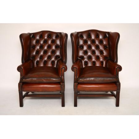 Ein Paar antiker Leder-Ohren Sessel