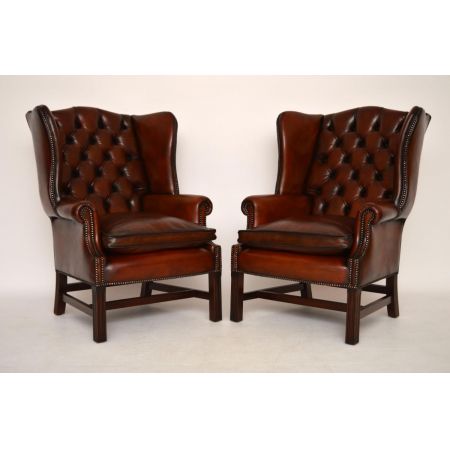 Ein Paar antiker Leder-Ohren Sessel