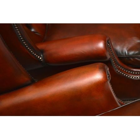 Ein Paar antiker Leder-Ohren Sessel