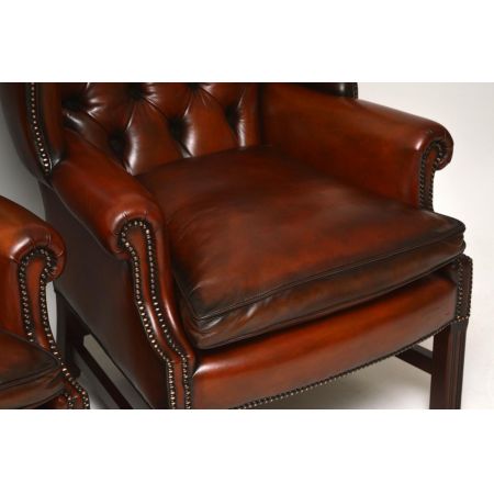 Ein Paar antiker Leder-Ohren Sessel