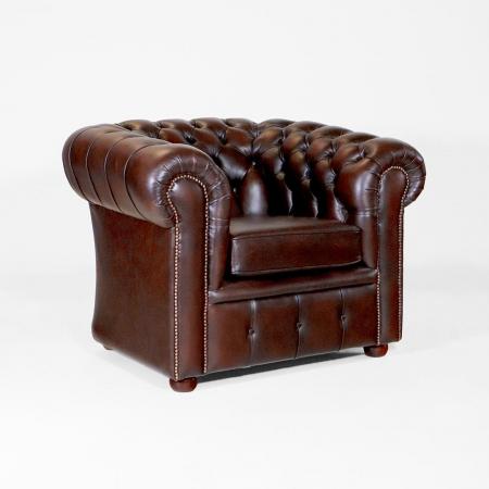 Luxuriöser brauner London-Classic Chesterfield Sessel aus hochwertigem Anilinleder – handgefertigt mit Massivholzrahmen und bequemer Polsterung.