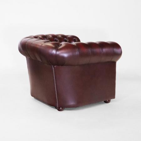 Luxuriöser London-Classic Chesterfield Sessel aus hochwertigem Anilinleder – handgefertigt mit Massivholzrahmen und bequemer Polsterung.